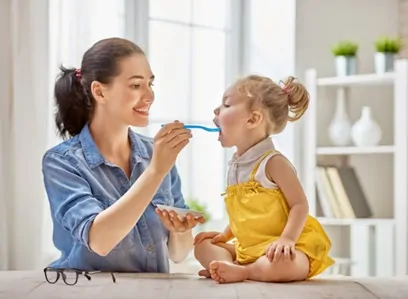 Mom feeding baby